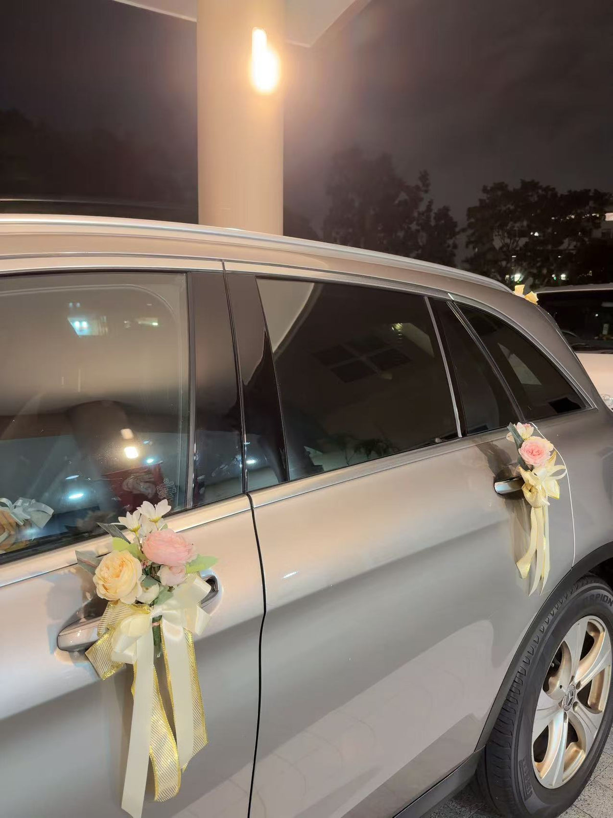 Side view showing custom door handle floral corsages